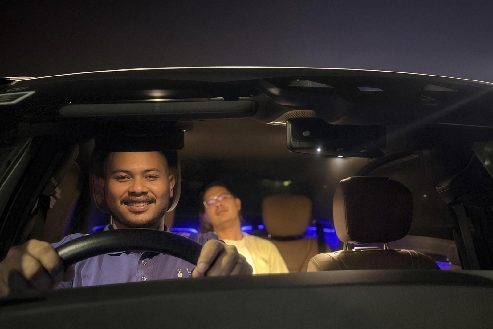 A Hi Valet driver taking a customer home safely in their own car at night
